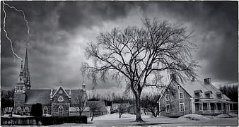 Dramatic Black and White Church and House with Lightning