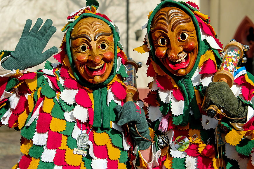 Two Swabian-Alemannic Carnival Performers in Colorful Flecklehäs Costumes