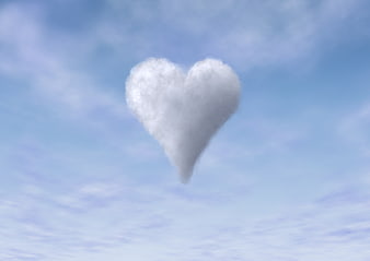 Heart-Shaped Cloud In Blue Sky