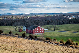 Red Barn in Pennsylvania Countryside with Railroad Tracks