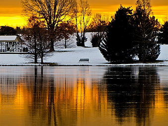 Serene Winter Lake Sunset with Golden Reflections