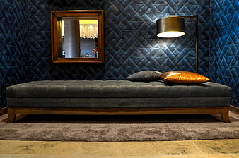 Luxury Blue Tufted Wall with Bench and Gold Lamp