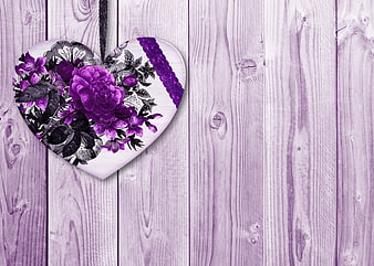 Purple Floral Heart Ornament on Vintage Wooden Background