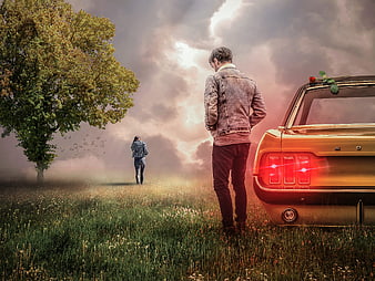 Man standing by vintage car watching woman walk away in field