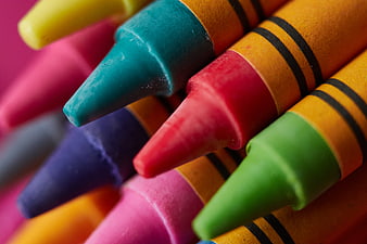 Close-up of colorful crayons with sharp tips