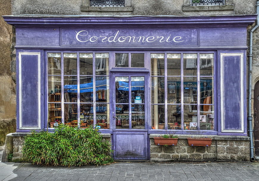 Purple Shoemaker Shop Front in European Town