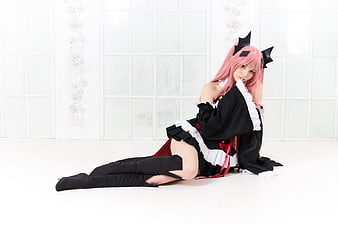 Pink-haired Cosplay Girl in Black Maid Outfit