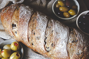 Rustic Artisan Bread Loaf with Olives and Olive Oil