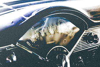 Vintage Chevrolet Speedometer Close-Up with Retro Dashboard Details