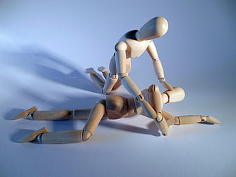 Wooden Mannequins Depicting First Aid Rescue Scene