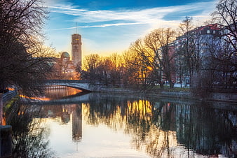 Sunset Reflections on River with Clock Tower and Bridge
