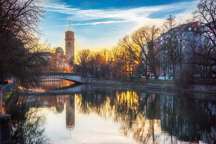 Sunset Reflections on River with Clock Tower and Bridge