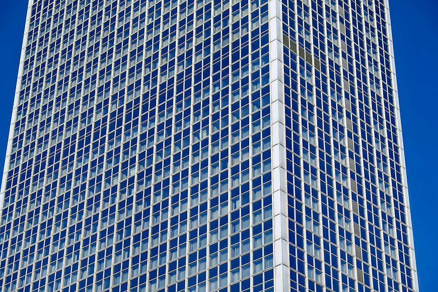 Modern Skyscraper Facade with Blue Glass Windows