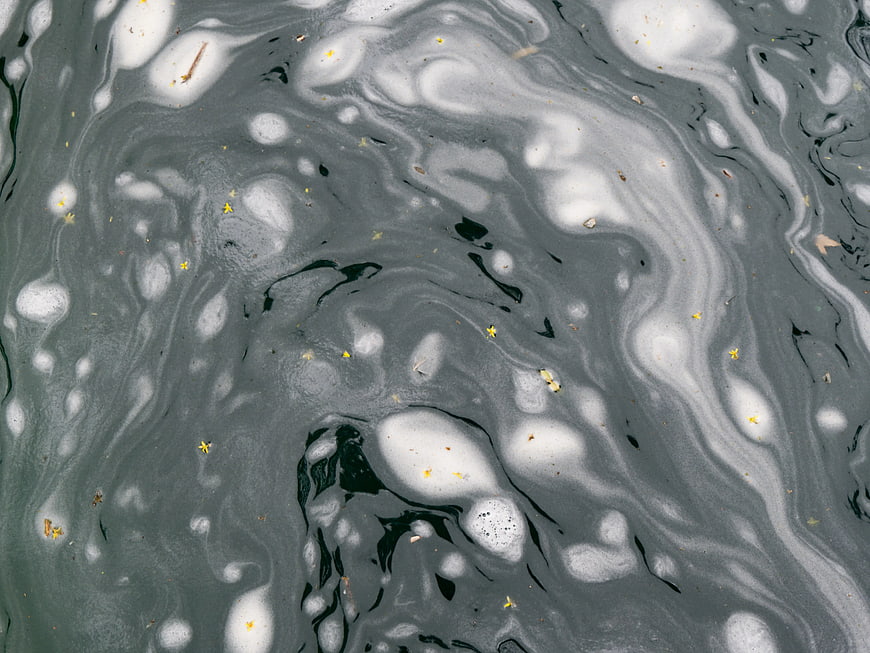 Abstract Gray and White Swirling Water Texture with Bubbles