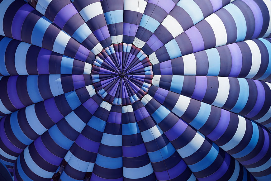 Abstract blue and purple striped hot air balloon interior pattern