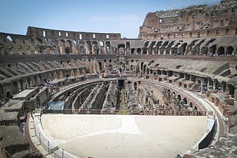 Interior view of the Colosseum arena floor and ruins in Rome