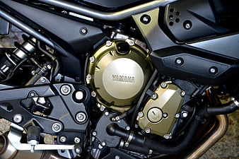 Close-up of Yamaha motorcycle engine with gold accents