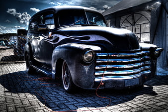 Vintage Black Chevrolet Panel Truck with Flames