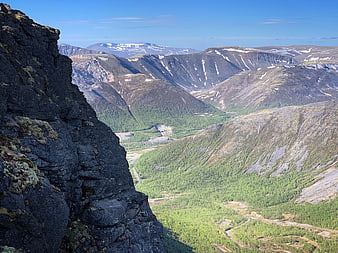 Scenic Mountain Valley View with Rocky Foreground