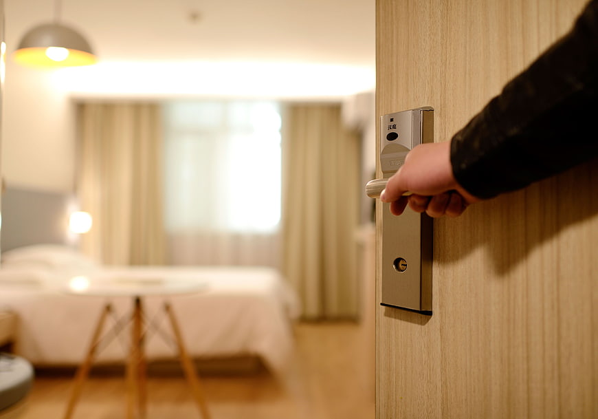 Hand Opening Hotel Room Door Handle