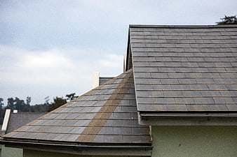 Modern Slate Roof Detail with Sky Background