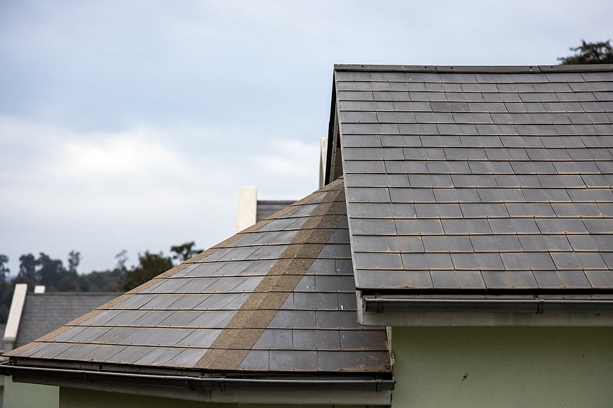 Modern Slate Roof Detail with Sky Background