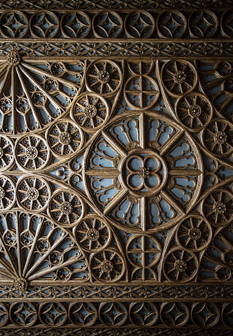 Intricate Carved Wooden Ceiling Detail With Geometric Floral Patterns