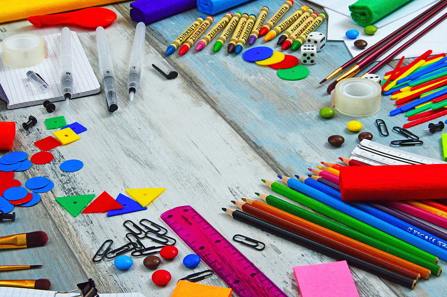Colorful School Supplies Flat Lay on Rustic Wooden Table