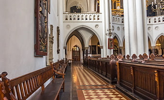 Interior of St. Mary's Church Berlin with wooden pews and arches