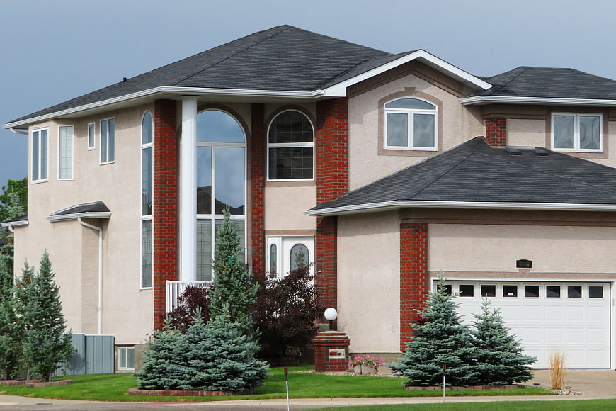 Modern Two-Story Suburban House with Brick Accents