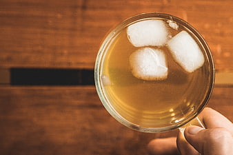 Top View of Iced Tea with Ice Cubes in Glass