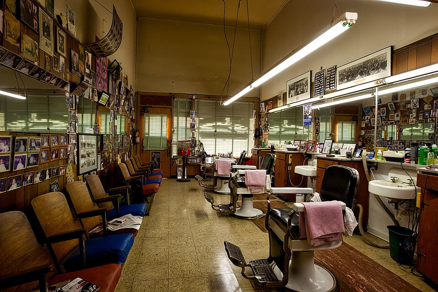Interior of a vintage barbershop with classic chairs and mirrors