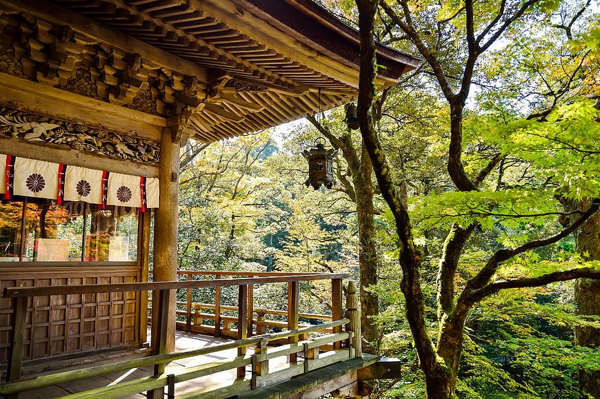 Traditional Japanese Temple Veranda in Lush Forest