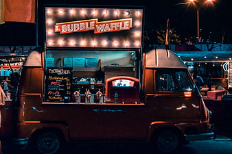 Vintage Food Truck Selling Bubble Waffles at Night Market