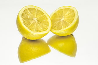 Fresh Cut Lemon Halves on White Background