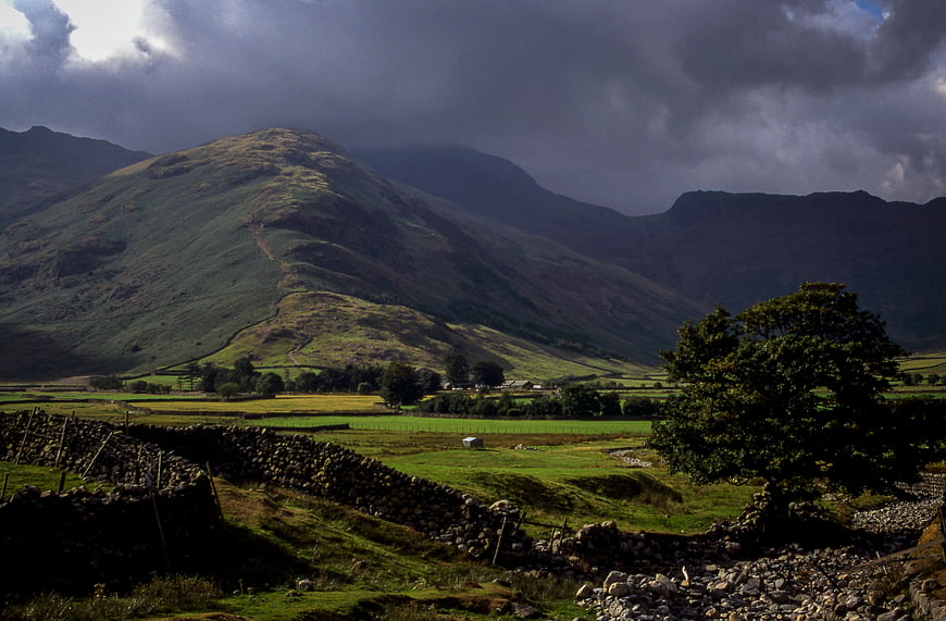 Dramatic Highland Landscape with Stone Walls and Mountains