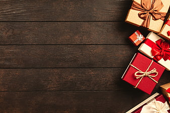 Christmas Gift Boxes On Dark Wooden Table With Copy Space