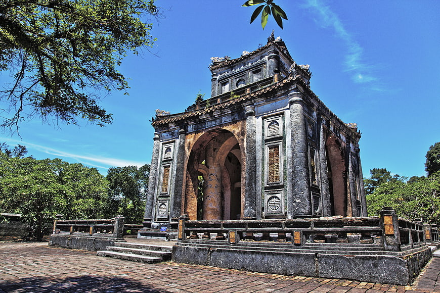Ancient stone temple architecture with blue sky background
