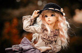 Vintage Ball-Jointed Doll Wearing Black Hat and Lace Outfit