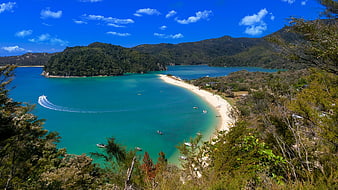 Aerial View of Turquoise Bay with Sandy Beach and Boats