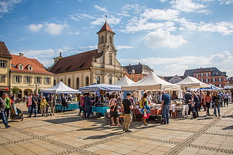 Outdoor flea market in historic European town square