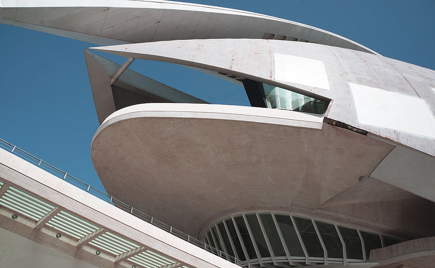 Modern white curved architecture against blue sky