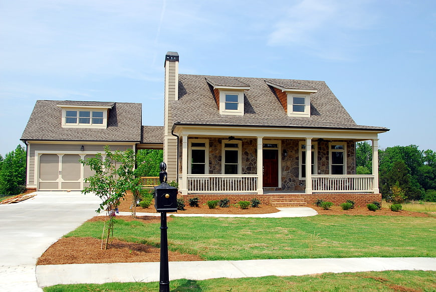 New suburban home with stone facade and front porch