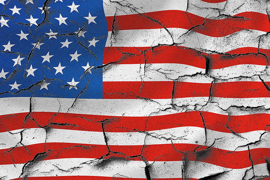 Cracked American Flag on Weathered Concrete Wall