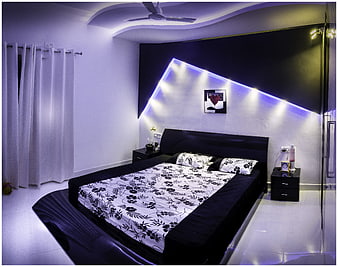 Modern Bedroom Interior With Black Bed And LED Accent Lighting