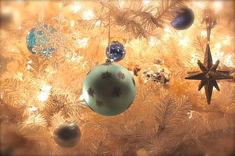Close-up of Vintage Christmas Tree with Glowing Lights and Ornaments