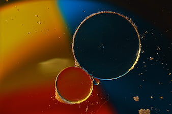 Abstract macro photography of oil and water bubbles with vibrant colors