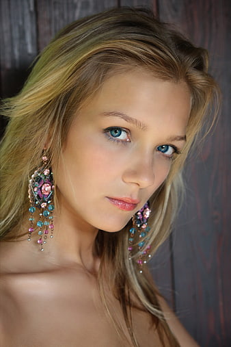Blonde Woman Portrait Wearing Colorful Beaded Earrings