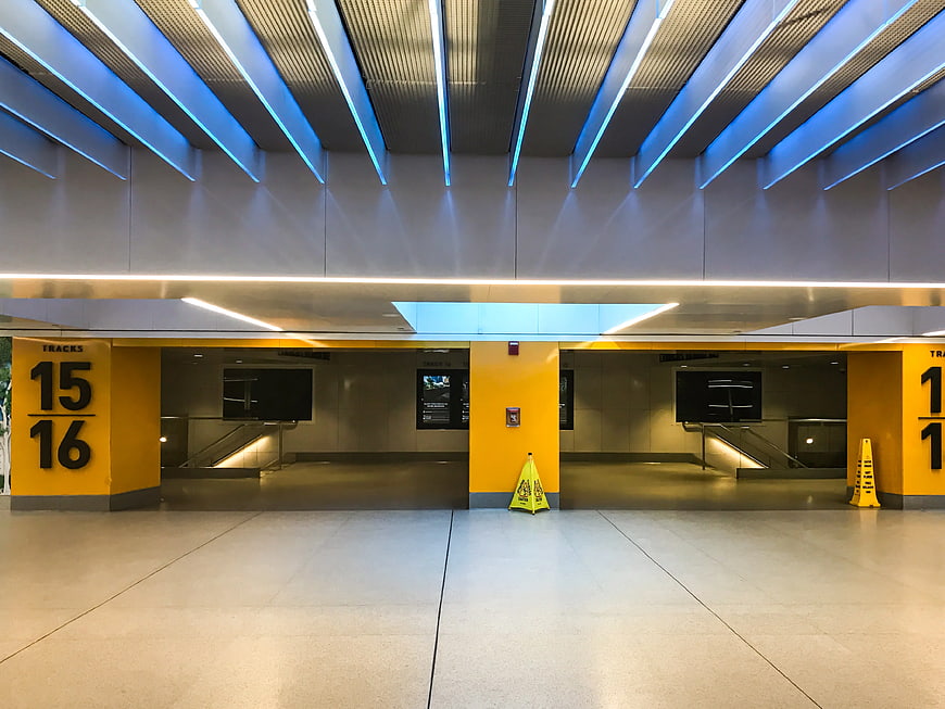 Modern Train Station Interior with Blue Ceiling Lights