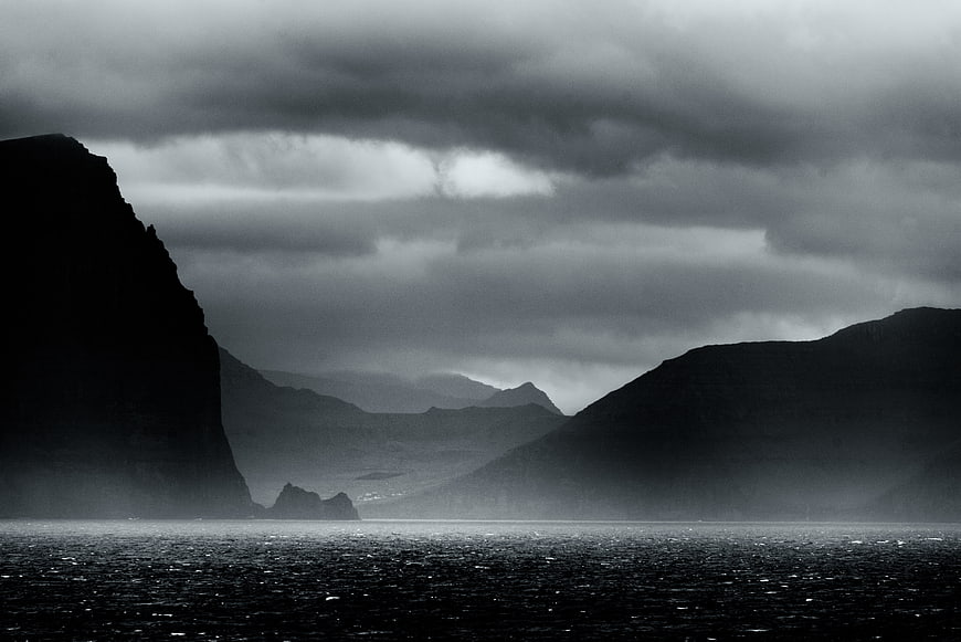 Dramatic Black and White Mountain Landscape with Misty Lake